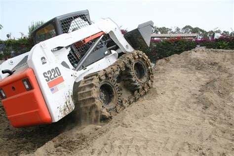 why is a skid steer called a skid steer|skid steer history.